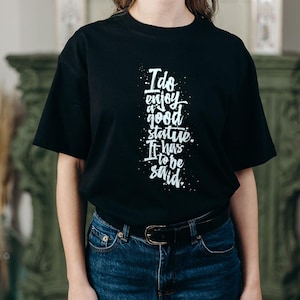 Derry Girls: Good Statue Unisex Softstyle T-Shirt