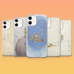 May include: A collection of five clear phone cases featuring illustrations from "The Little Prince." The designs include the Little Prince with a fox, on an asteroid, and other scenes with yellow stars and a blue background.