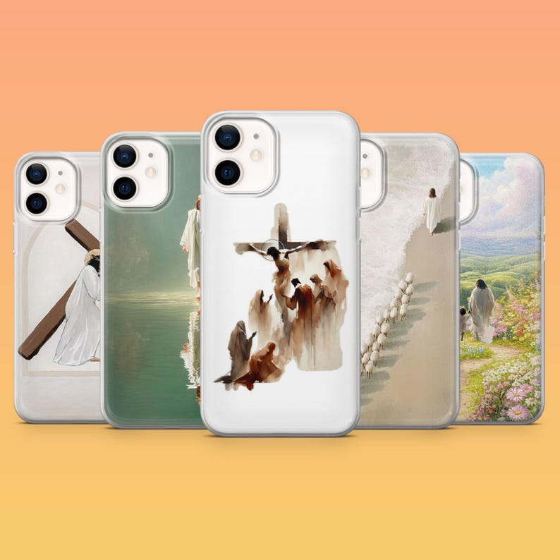 May include: A collection of five phone cases with religious artwork. The cases feature images of Jesus carrying a cross, scenes from the Bible, and other religious imagery. The cases are clear with a white border and are designed to fit a smartphone.