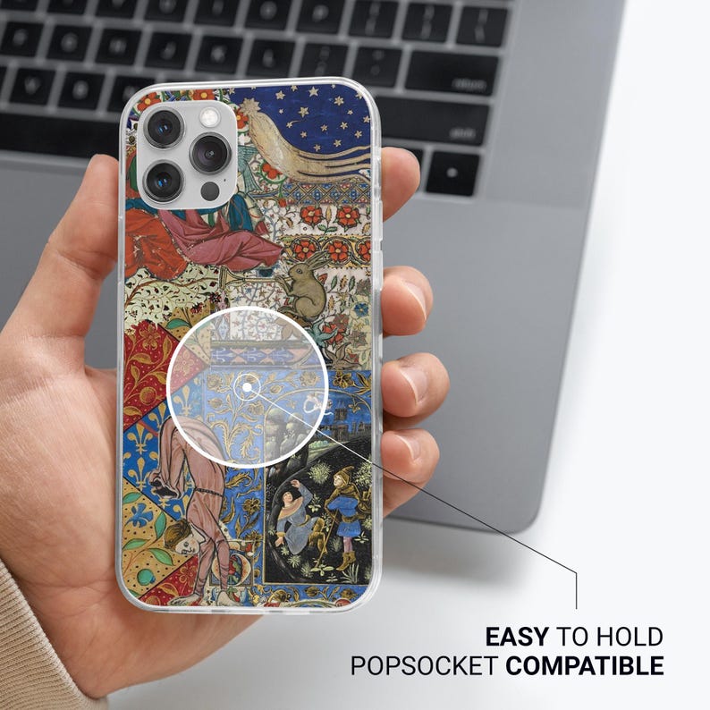 May include: Clear phone case with a colorful medieval tapestry design. The case features a variety of images, including figures, animals, and floral patterns. Text on the case reads "EASY TO HOLD POPSOCKET COMPATIBLE".