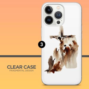 May include: Clear phone case with a watercolor illustration of Jesus on the cross, surrounded by figures in flowing robes. The case has a white background and the text "CLEAR CASE FRAGMENTAL DESIGN".