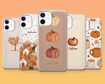 Puede incluir: Una colección de fundas para teléfonos con diseños de otoño. Las fundas presentan ilustraciones de calabazas, paisajes otoñales y los textos "Autumn" y "Hello October". La paleta de colores incluye naranja, marrón y beige.