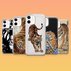 May include: A collection of phone cases featuring tiger designs. The cases display various tiger illustrations, including a stretching tiger, a tiger with a sword, and abstract tiger patterns. The cases are in a row against an orange background.