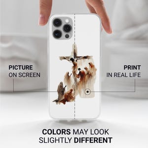 May include: A clear phone case featuring a religious scene with a cross and figures in shades of brown and white. The text "PICTURE ON SCREEN" and "PRINT IN REAL LIFE" are visible. The text "COLORS MAY LOOK SLIGHTLY DIFFERENT" is also present.