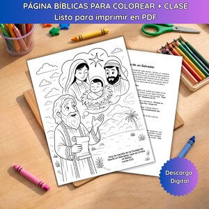 May include: Black and white coloring pages with biblical scenes, including the nativity and a man with a scroll. The text on the page reads "Hoy ha nacido en la Ciudad de David un Salvador, que es Cristo el Señor. Lucas 2:11". Crayons and scissors are visible.