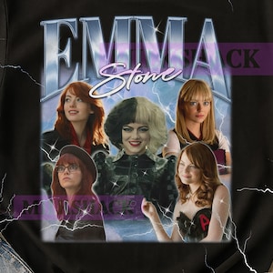 May include: Black t-shirt featuring a graphic of Emma Stone in various roles, with the name "EMMA Stone" in a vintage-style design. The design includes a blue and purple background with lightning bolt accents.