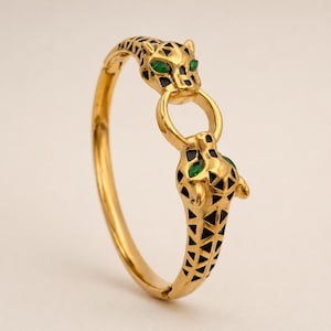 Gouden luipaardarmband – statement scharnierarmband