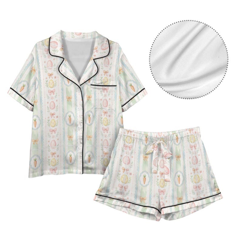 May include: A white ceramic mug with a black handle and the text "But First, Coffee" in a black, handwritten-style font. The mug is on a white surface.