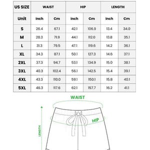 May include: A chart detailing the measurements for all-over print satin short-sleeve pajama shorts. The chart includes US sizes, waist measurements in inches and centimeters, hip measurements in inches and centimeters, and length measurements in inches and centimeters. A diagram of the shorts is also included.