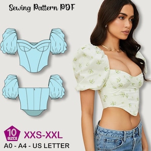 May include: A light blue corset sewing pattern PDF with puff sleeves. The pattern includes sizes XXS-XXL and is compatible with A0, A4, and US Letter paper sizes. A woman is wearing a floral top with puff sleeves.