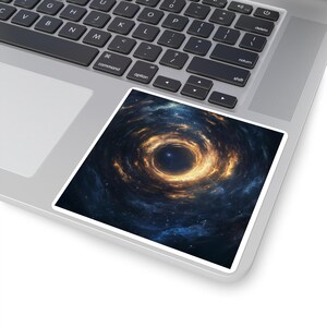May include: A square sticker featuring a swirling galaxy design. The artwork showcases a central vortex of warm orange and yellow hues, surrounded by a deep blue and dark space background. The sticker is placed on a laptop.