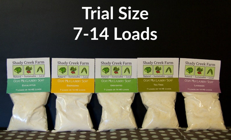 May include: Five small bags of goat milk laundry soap in trial size, each containing 7-14 loads. The bags are labeled with different scents: Eucalyptus, Energizing, Unscented, Tea Tree, and Lavender.