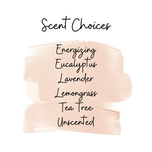May include: A list of scent choices for a product, written in black text on a peach-colored background. The choices are: Energizing, Eucalyptus, Lavender, Lemongrass, Tea Tree, and Unscented.