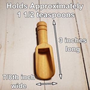 May include: A small wooden scoop, 3 inches long and 7/8 inch wide, holds approximately 1 1/2 teaspoons.