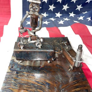 Welding Man Figurine: Detailed Metal Art Display
