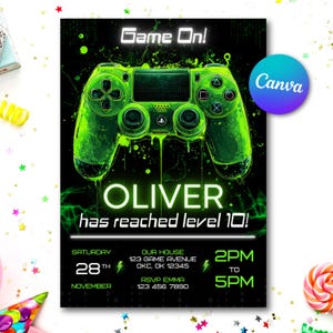 May include: A black and green gaming-themed invitation featuring a neon green controller graphic. The text "Game On!" is at the top, with "OLIVER has reached level 10!" below the controller. Details include the date, time, and RSVP information.