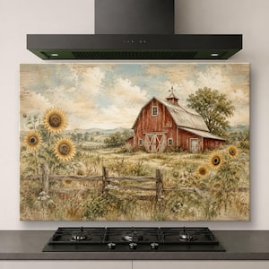 Può includere: Un pannello decorativo rettangolare con un dipinto paesaggistico raffigurante un fienile rosso con tetto in metallo, una staccionata in legno e girasoli gialli in primo piano sotto un cielo nuvoloso, montato sopra un piano cottura a gas.