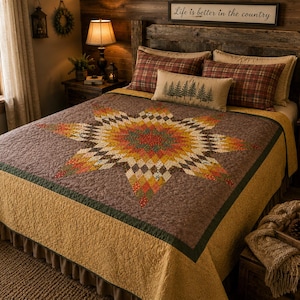 May include: A bed quilt featuring a large central star pattern composed of small multicolored fabric squares in shades of orange, yellow, green, and brown, surrounded by a solid mustard yellow border and a dark brown textured fabric background.