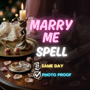 May include: An image featuring a lit candle in a decorative holder, two rings, and the words "MARRY ME SPELL" in pink and white. The scene includes dried roses, petals, and a scroll, suggesting a romantic or spiritual theme.