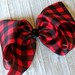 ciamia1212 reviewed Red Buffalo Plaid 7 Inch Hair Bow - Buffalo Plaid Hair Bow - 8" Bow Red and Black Plaid - Girl Boutique Bow - Toddler Barrette Hairbow