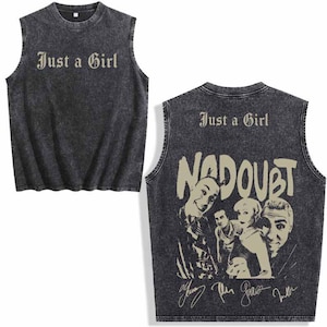 May include: A sleeveless, charcoal-colored tank top with the text "Just a Girl" printed on the front. The back features the band name "No Doubt" and a graphic of the band members. The design is vintage-inspired.