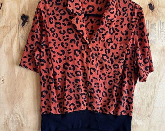 Vintage Kelly Scott Orange Animal Print Short Sleeve Banded Hem Blouse