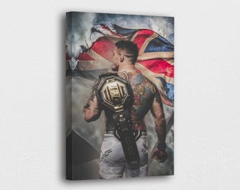 May include: Canvas print featuring a person with tattoos, holding a championship belt and a British flag. The image has a dramatic, artistic style with a focus on the subject's back and the flag's colors.