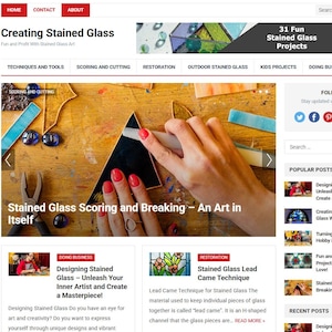 May include: Website homepage titled "Creating Stained Glass" with the tagline "Fun and Profit With Stained Glass Art." The page features articles on techniques, scoring, cutting, and restoration. A hand is shown scoring a piece of black glass. The site also has a search bar.