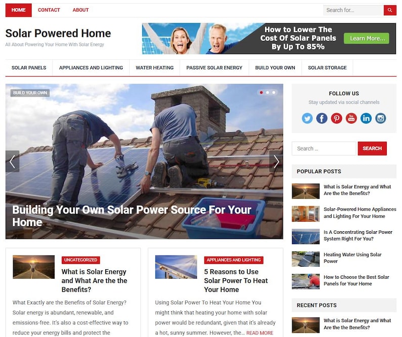May include: Website homepage for "Solar Powered Home" with text and images. Two people install solar panels on a roof. The site offers information on solar panels, appliances, water heating, and more. The banner reads "How to Lower The Cost Of Solar Panels By Up To 85%"