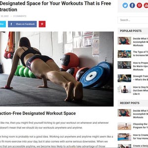 May include: A person in athletic wear doing push-ups on a gym floor. The image is from a blog post titled "Create a Designated Space for Your Workouts That is Free From Distraction". Gym equipment, including weights and medicine balls, is visible.