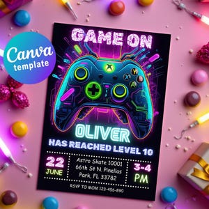 May include: A black invitation card with a neon-style video game controller design. The text "GAME ON" and "OLIVER HAS REACHED LEVEL 10" are displayed. Includes event details: June 22, 3-4 PM, and an address. The Canva template logo is in the upper left corner.