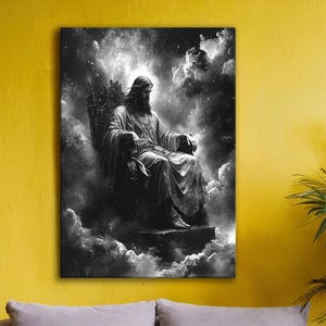 May include: Black and white canvas art depicting a figure seated on a throne amidst clouds. The artwork is displayed on a yellow wall above a gray sofa. A potted plant and a small side table with a plant are in the foreground, adding a touch of nature to the room.