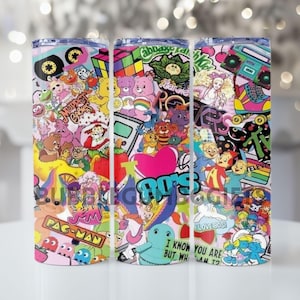 May include: Three stainless steel tumblers featuring a colourful 80s design. The tumblers are adorned with cartoon characters, logos, and phrases such as "I Love 80s!" and "Pac-Man". The design includes images of Care Bears, Smurfs, and other nostalgic icons.