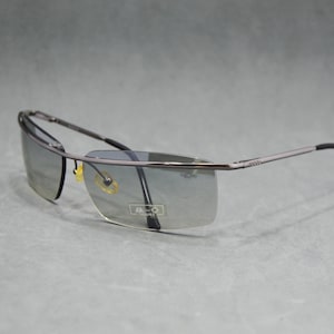 Vintage Rimless Sunglasses. NUDOS 204 C65. Spain. 00s New old Stock. Unisex Man Woman. Gunmetal Black. Semi- Mirrored Gradient Grey Lenses
