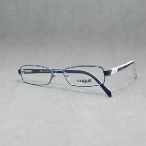 Vintage Eyeglasses Vogue 3740 880 Loxuttica Italy 2010s. NOS Unworn. Unisex. Blue White black. Available Rx lenses. Regular size 54 17 140
