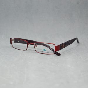 Vintage Eyeglasses COLLECTION CREATIVE 1389 900 Germany. Narrow Rectangular. Unisex reading eyewear . Availables RX lenses. Red. 00s
