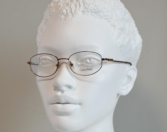 Vintage Eyeglasses CALVIN KLEIN 423 551. Italy 10s. NOS Eyewear. Unisex Woman Man. Brown. Available Rx lenses. Regular size. Oval hexagonal