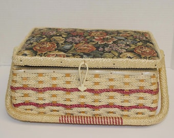Vintage rectangular sewing basket with a woven wicker body with floral tapestry padded lid