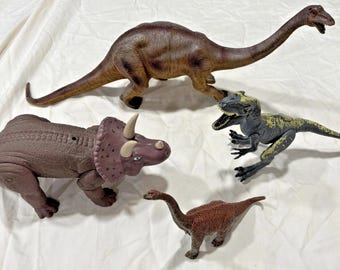 Lot de 4 dinosaures Jurassic Park Apatosaurus Triceratops Velociraptor