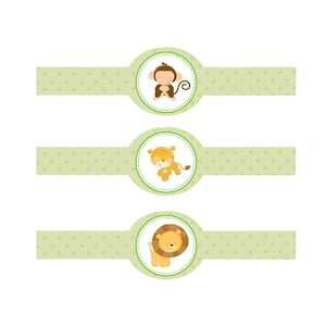 May include: Three light green labels with a dotted pattern. Each label features a different cartoon animal: a monkey, a cheetah, and a lion. The animals are in a circular design with a green dotted border.