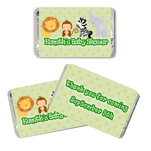 May include: Green and white favor tags with a polka dot pattern. The tags feature a lion, monkey, zebra, and elephant. The text on the tag reads "Kenneth's Baby Shower" and "Thank you for coming September 9th".