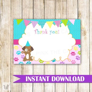 May include: Printable thank you card with a cute cartoon dog wearing a party hat. The card has a blue and white polka dot background with colorful pennant flags at the top. The text "Thank you!" is written in a pink font. The card is perfect for a dog-themed party.