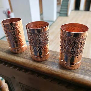 Detail of the diamond-cut embossed design on the copper drinkware.