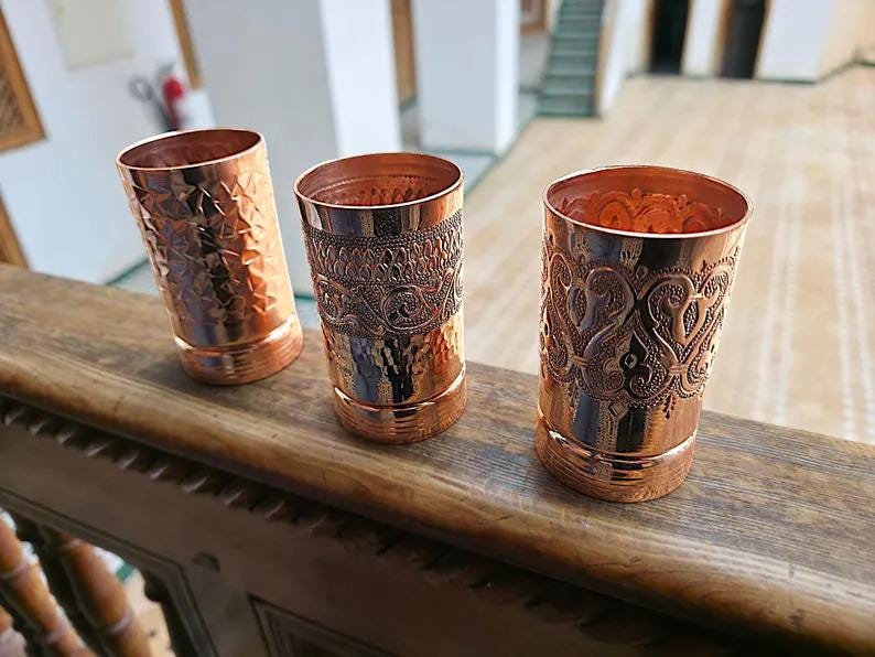 Detail of the diamond-cut embossed design on the copper drinkware.