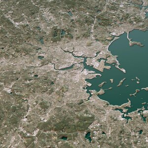 May include: Aerial view of a coastal city, featuring a large body of teal water and a complex urban landscape. The city is densely populated with buildings and infrastructure, with a network of roads and waterways. The image is a detailed, high-angle shot.