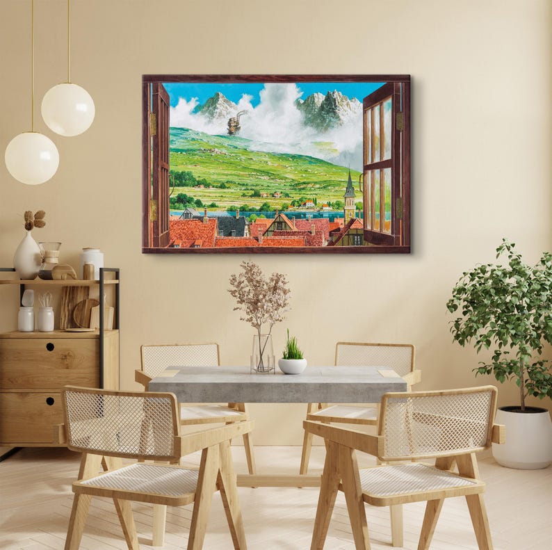 May include: A framed artwork depicting a vibrant landscape scene viewed through an open window. The artwork showcases a green hillside, snow-capped mountains, and a town with red-tiled roofs. The window frame is brown, and the sky is blue.