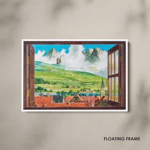 May include: A framed artwork depicting a landscape scene viewed through an open window. The artwork features a vibrant green hillside, snow-capped mountains, and a town with red-tiled roofs. The window frame is dark brown, and the artwork is labeled "FLOATING FRAME".