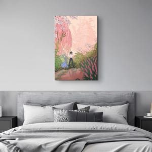 May include: A framed art print depicts a serene landscape with two figures in a garden setting. The artwork features a soft color palette of pinks, greens, and purples, with a weeping cherry tree and a distant castle. The figures are walking on a path.