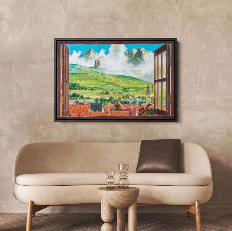 May include: A framed artwork depicts a vibrant landscape scene viewed through an open window. The artwork showcases a village with red-tiled roofs, green hills, and snow-capped mountains under a blue sky with fluffy clouds. A hot air balloon floats in the sky.