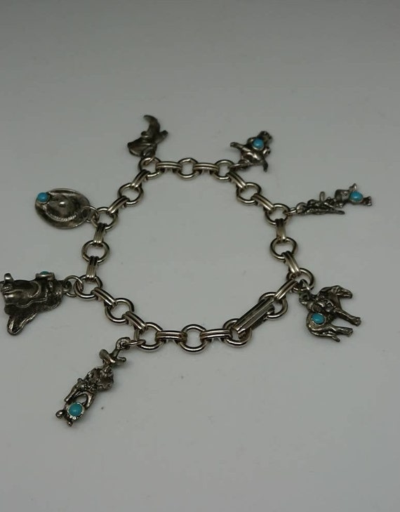 Cowboy Hat, Boots, And Lasso Vintage Native American Navajo Sterling Silver Bracelet Cowboy Hat, Boots, And Lasso Vintage Native American Navajo Sterling Silver Bracelet